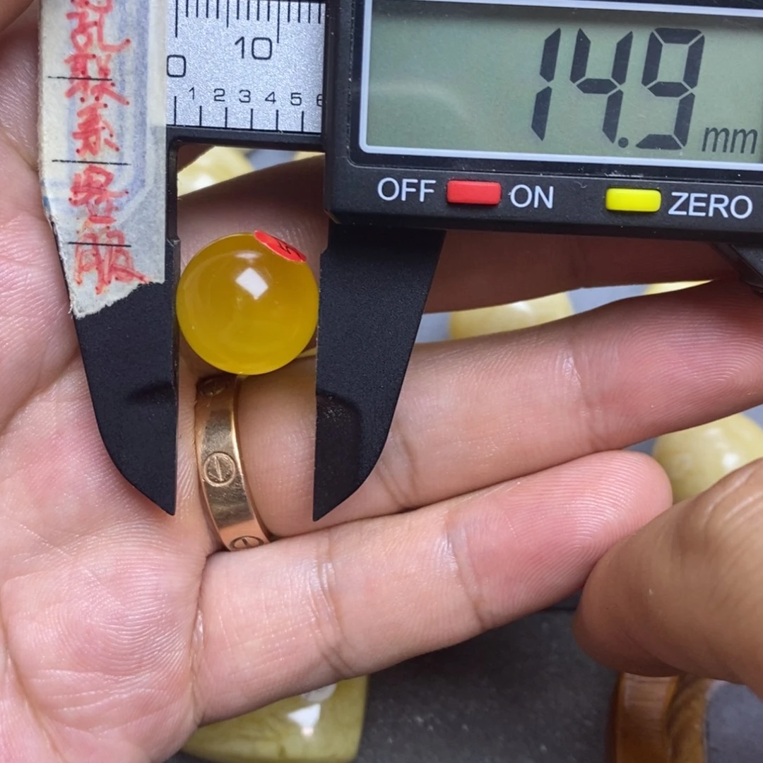 裸石蜜蜡未镶嵌14.9瑕疵圆珠默认直发