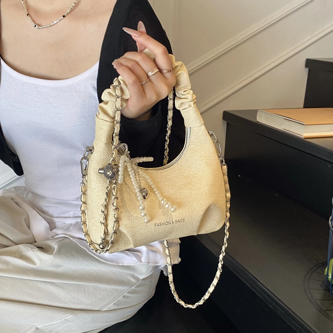 牛仔手提斜挎包韩系新款春夏日常通勤包包猪大肠褶皱设计女时尚