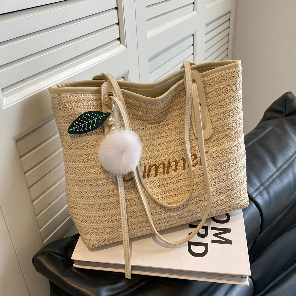 编织水桶包包2025新款时尚网红爆款洋气女大容量单肩大包草编包