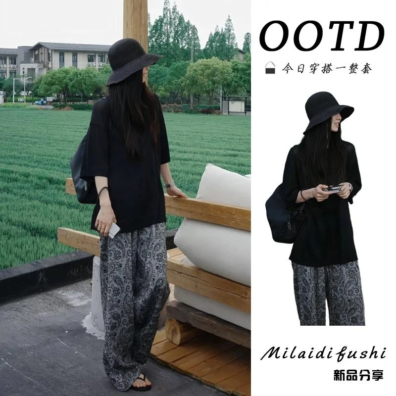 夏季韩系穿搭女2025新款慵懒风显瘦T恤上衣高腰花纹阔腿裤两件套