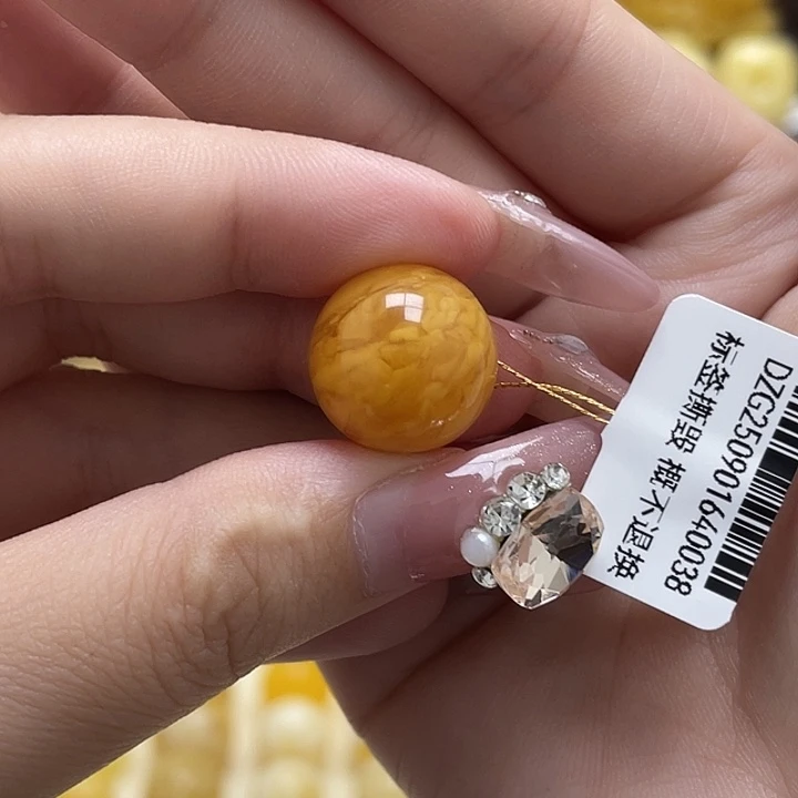琥珀未镶嵌裸石15.6mm鸡油红虎皮妖圆珠瑕