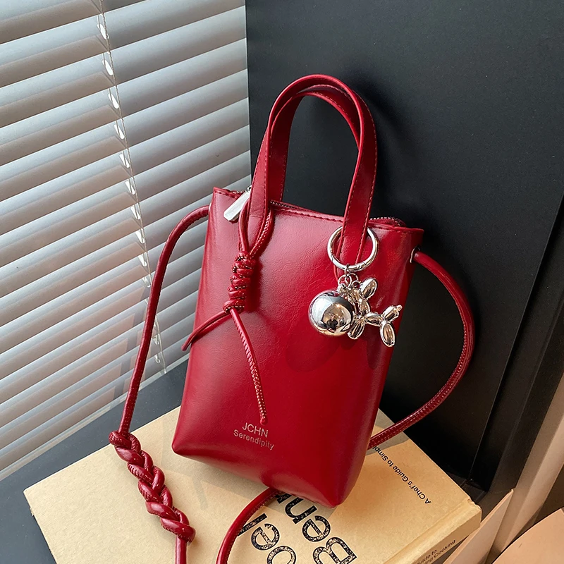 真皮质感洋气薯条包包女夏季时尚爆款手机包百搭手提单肩斜挎包女