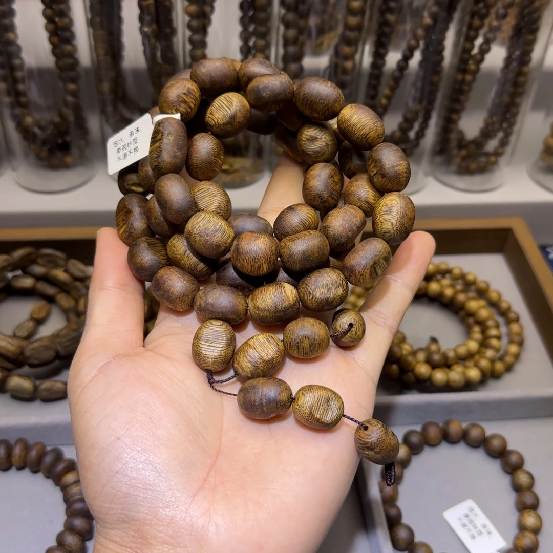 沉香沉香香囊海南乌身白棋沉水浮留疤1.3单圈65+