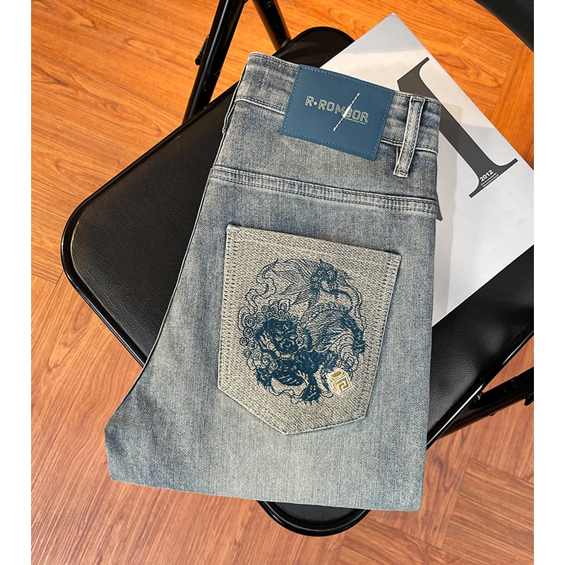 高端浅色水洗个性刺绣破洞补丁牛仔裤男春夏款修身弹力小脚长裤潮