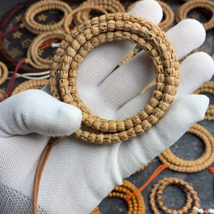 凡***人手串柏香籽/百香籽热振方块顺多棱纹