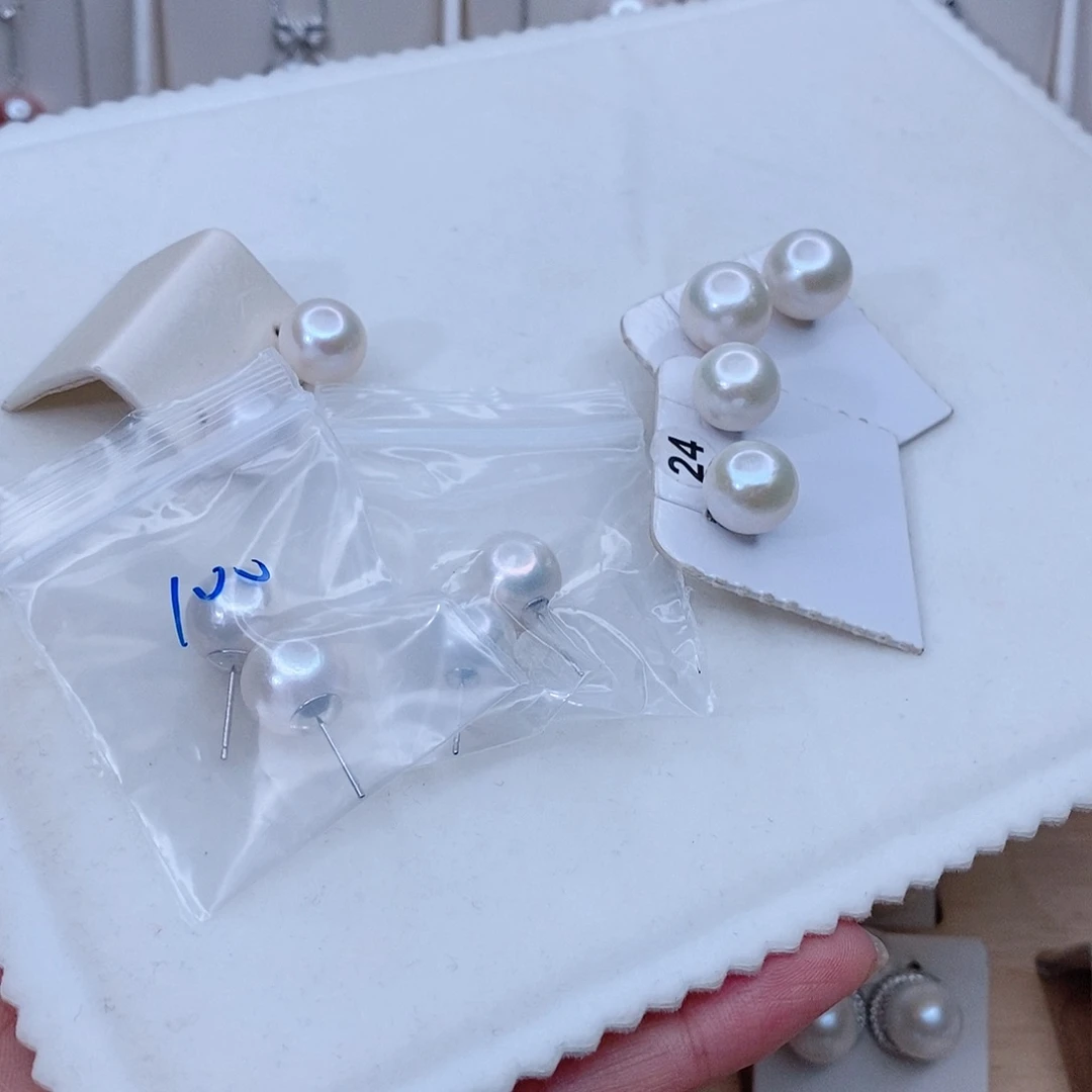 银S925镶嵌耳环淡水珍珠S****a