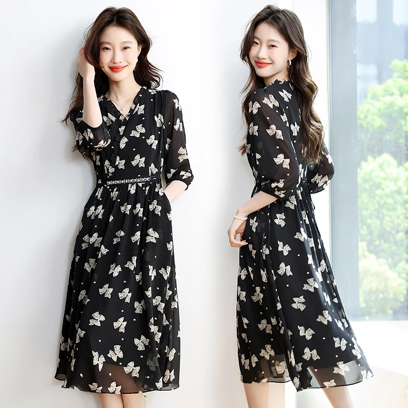 女士碎花连衣裙2025夏季新款收腰显瘦气质V领7分袖中长款大摆裙子