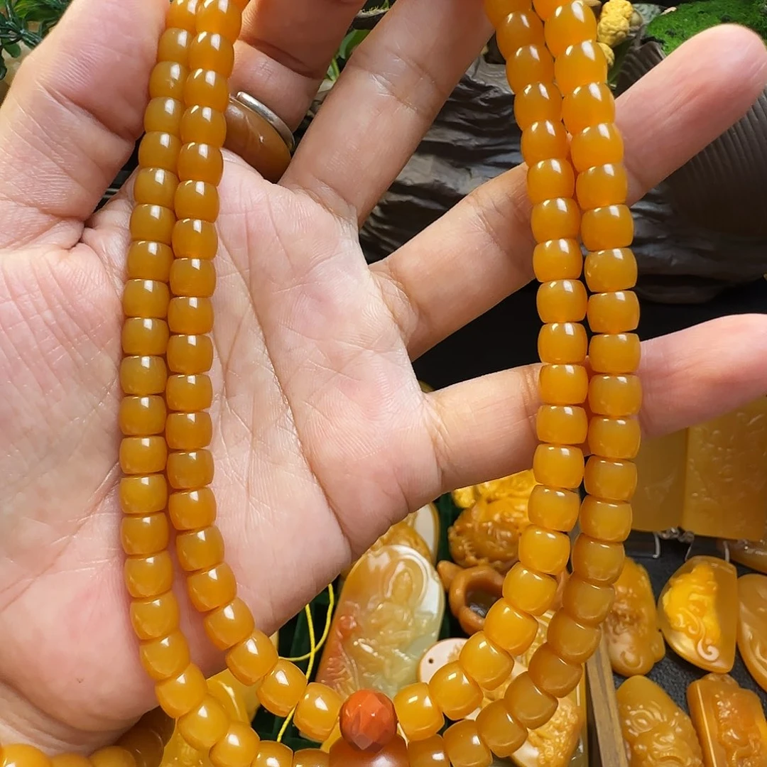 时***素石英质玉（黄龙玉）未镶嵌吊坠缅黄 卡7.5鸡油黄长串