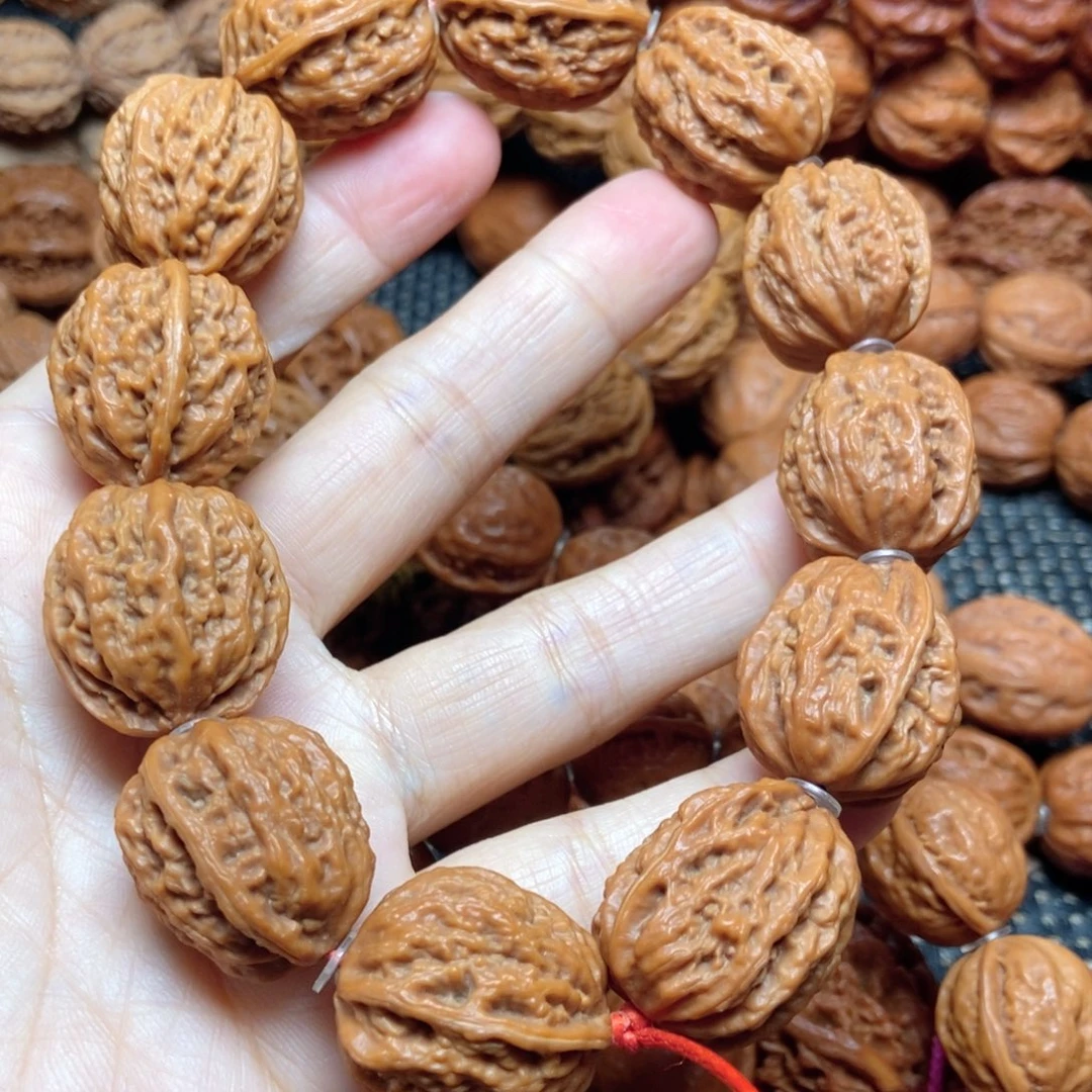 庆***子手串文玩核桃蚂蚁沟手串