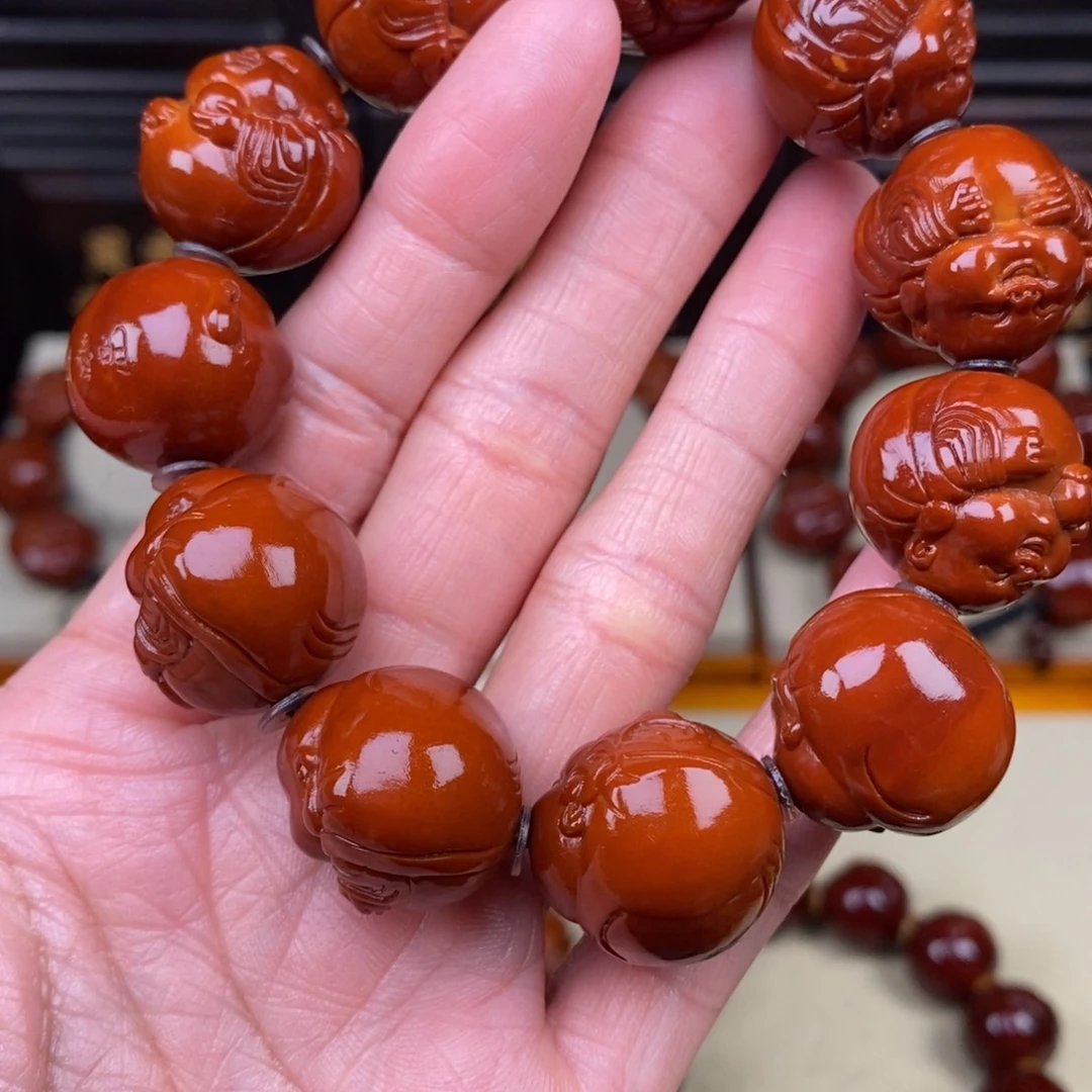 冷***漠橄榄核吊坠八宝弥勒