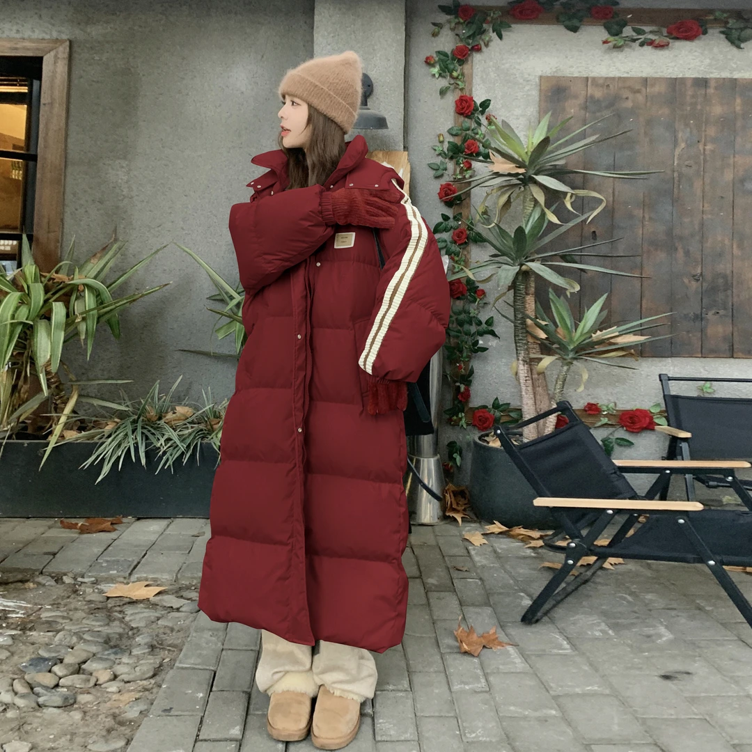 设计感长款羽绒服女冬季2025新款韩版休闲风加厚保暖白鸭绒面包服