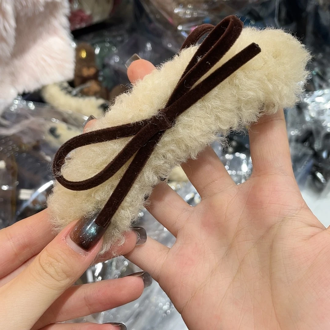 非金属米色蝴蝶结香蕉夹