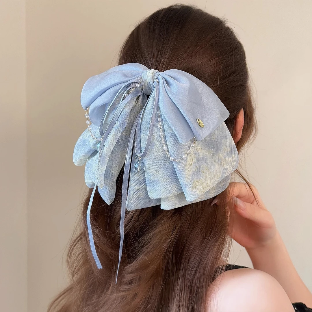 夏日新款网纱流苏蝴蝶结马尾夹2025法式轻奢甜美金标银丝轻纱发夹