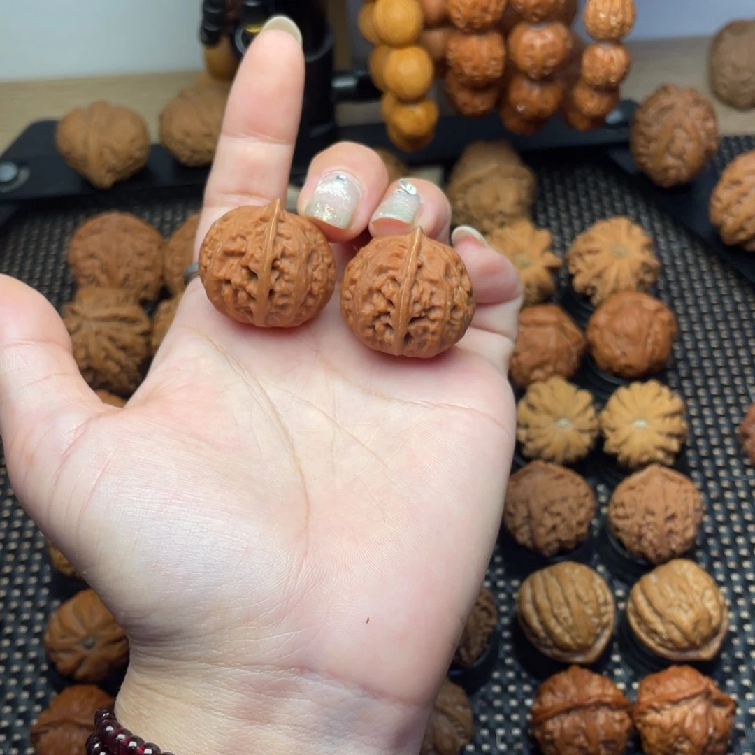 文玩把件粉红皮小元宝