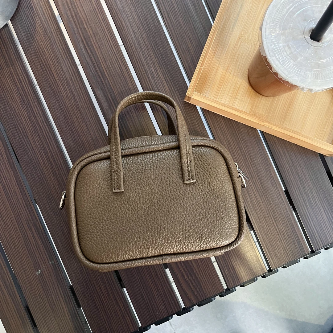 Nora Diary 简约头层牛皮羽毛包手提斜挎