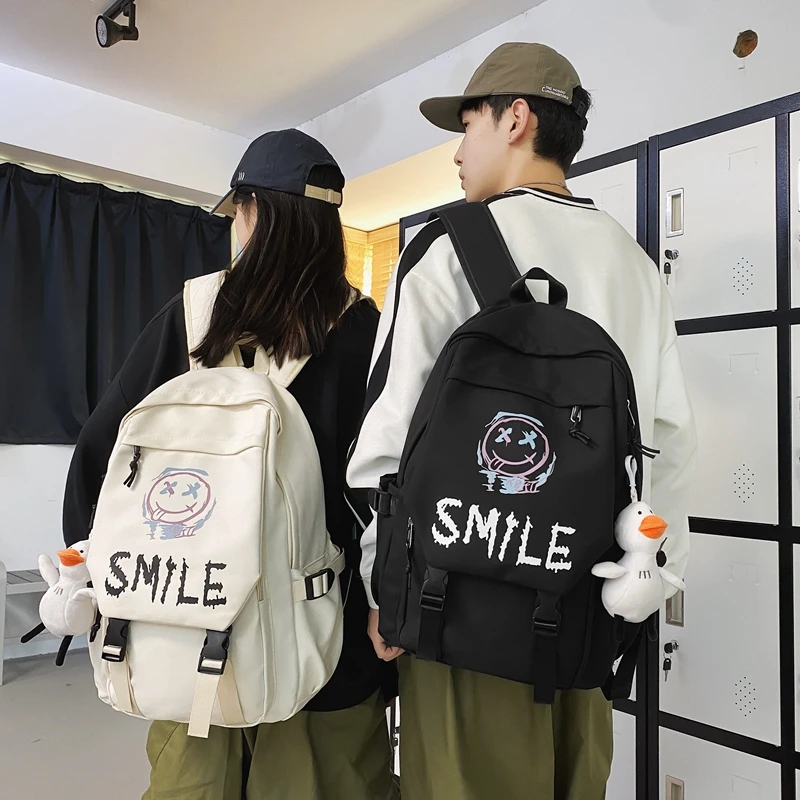 潮流双肩包男款大学生书包女生初中学生小众高中生美式旅行背包