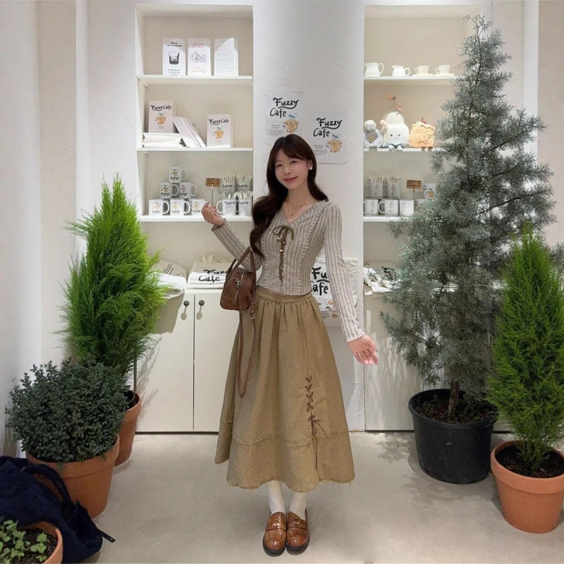 温柔风套装女2025秋季甜美设计感绑带修身长袖上衣高腰A字半身裙