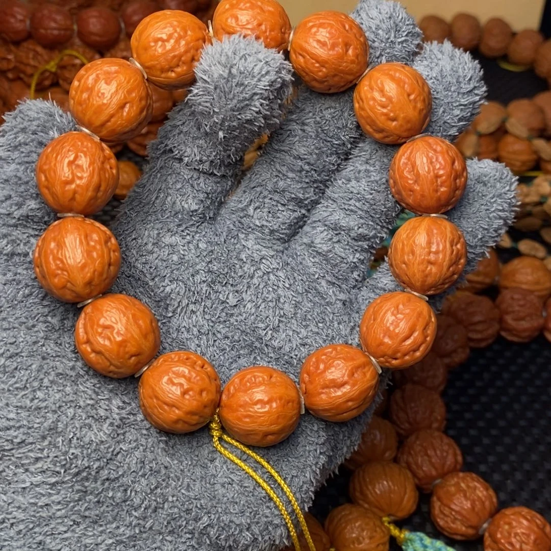 宫***蛉文玩核桃吊坠光头玻璃球手持