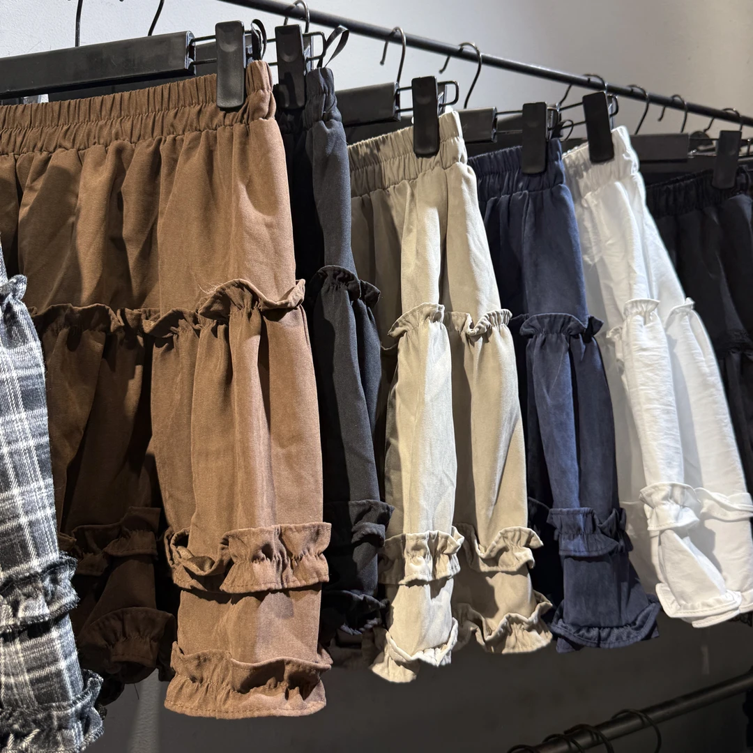 时尚木耳花边拼接款短裙女秋季新款高腰显瘦A字裙百搭遮胯半身裙