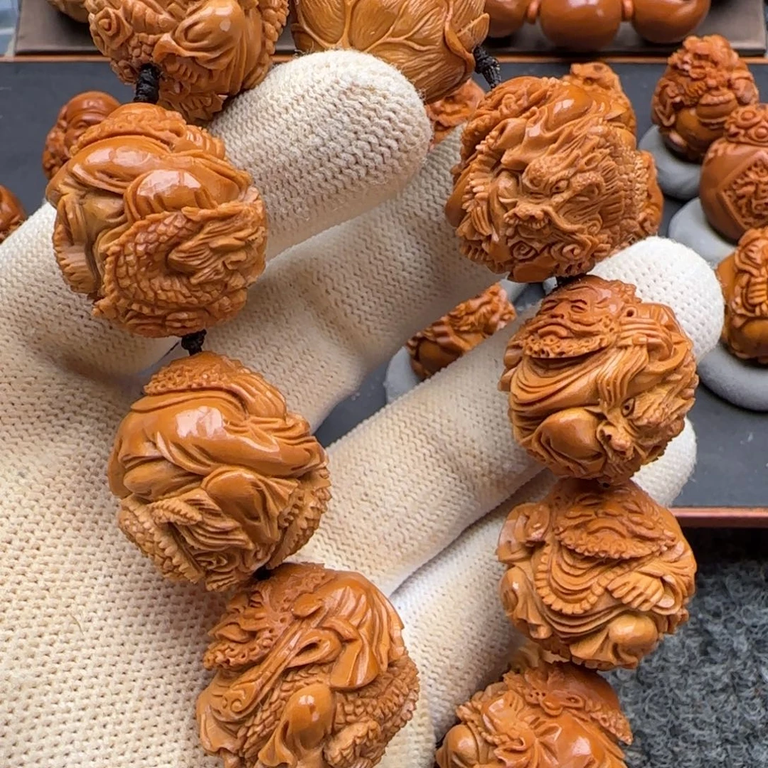 琪***哥橄榄核吊坠……………………