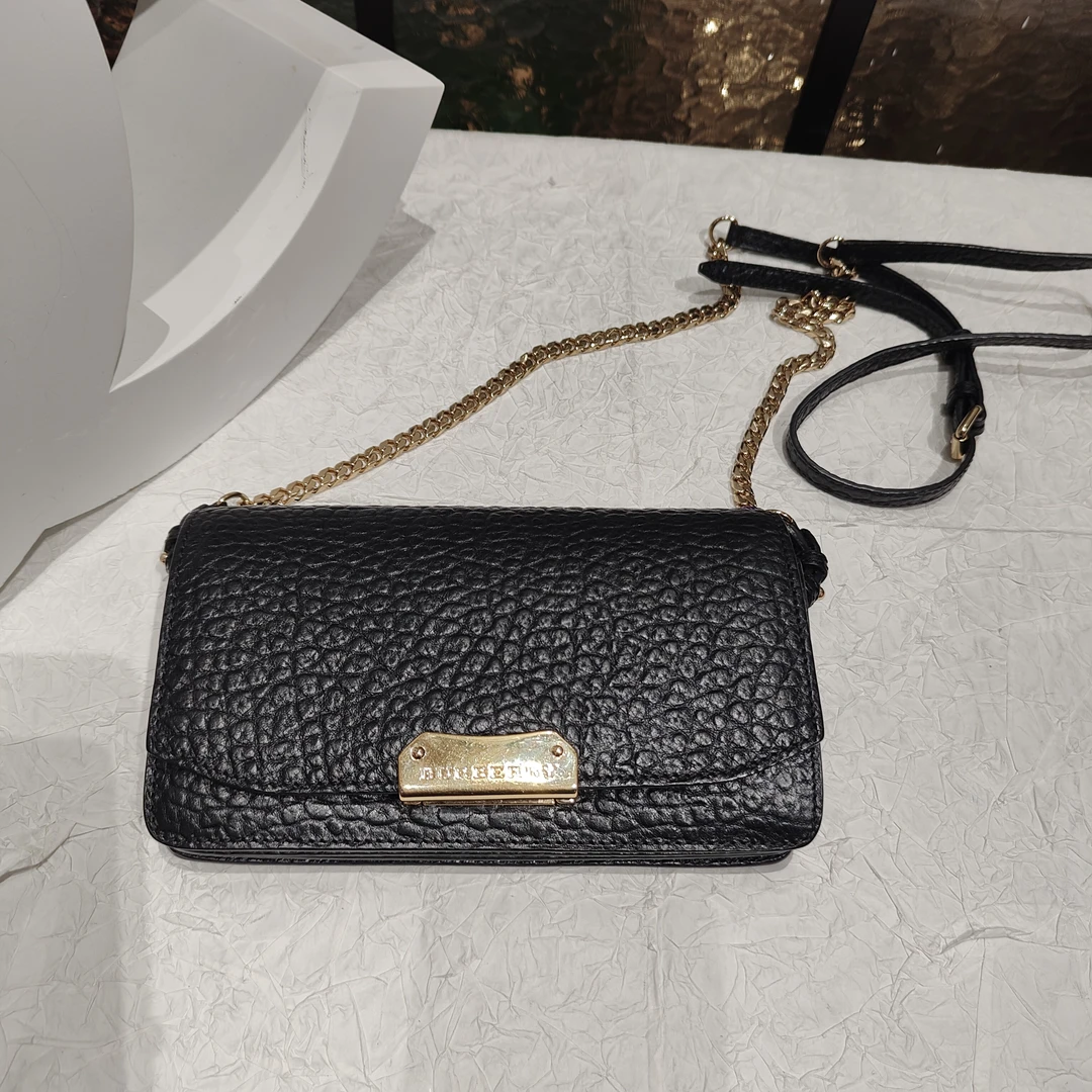 95新 BURBERRY/博柏利 巴宝莉黑金手拿斜挎包25020133-01