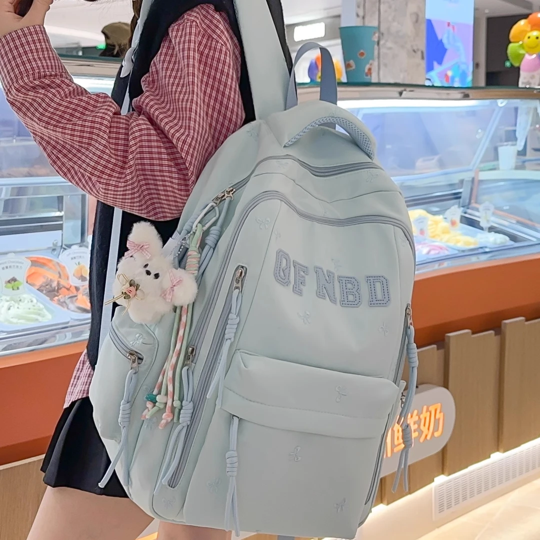 书包女生初中生超大容量中学生高中小学生3-6年级轻便减负双肩包