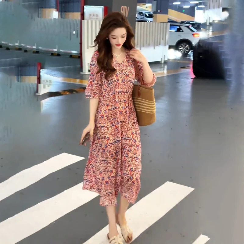 夏季新款时尚气质显瘦碎花连衣裙女设计感小众收腰显瘦长裙子