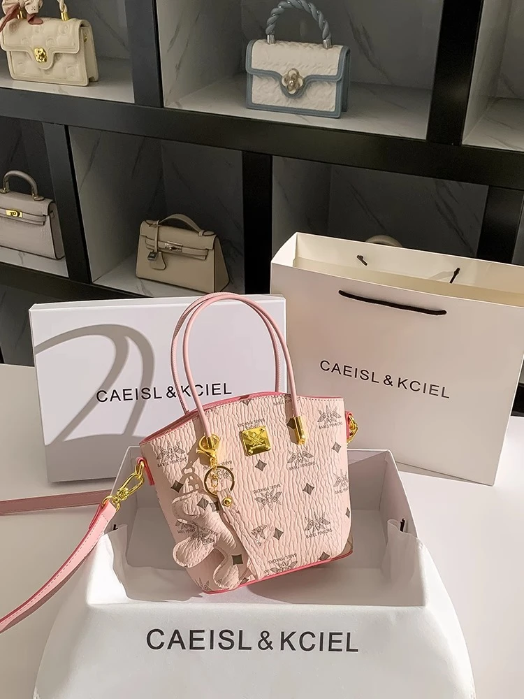 CAEISL&KCIEL小众高级感粉色印花水桶包2025新款潮通勤手提斜挎包