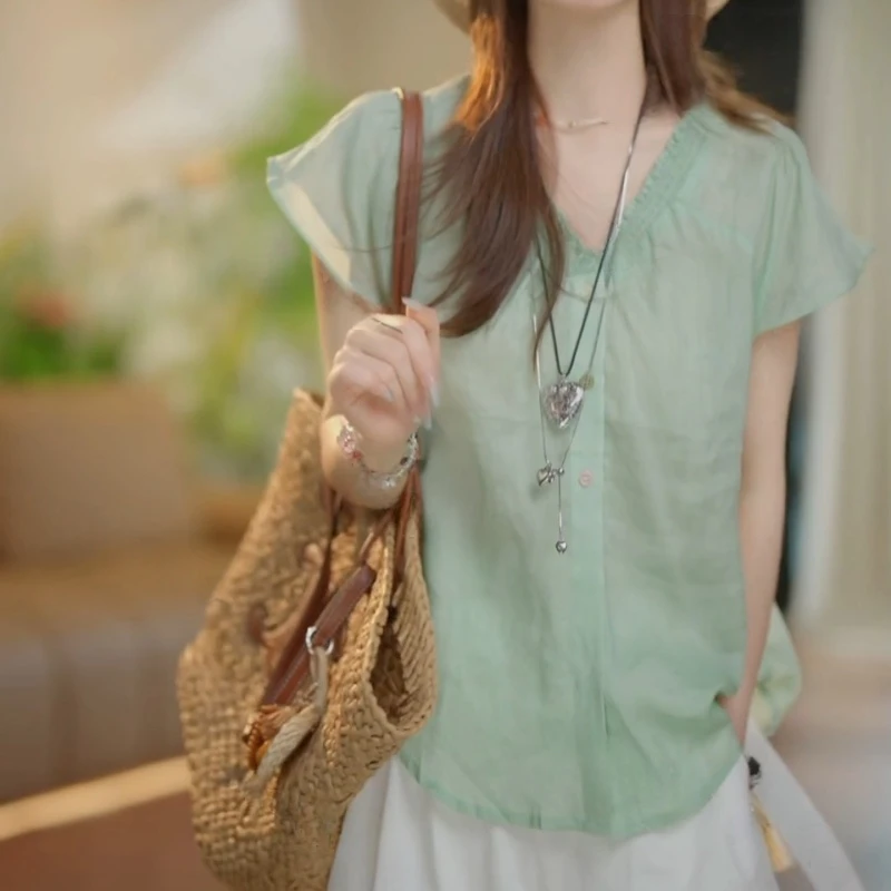 2025夏女新款法式褶皱彩扣上衣衬衫LK2503788