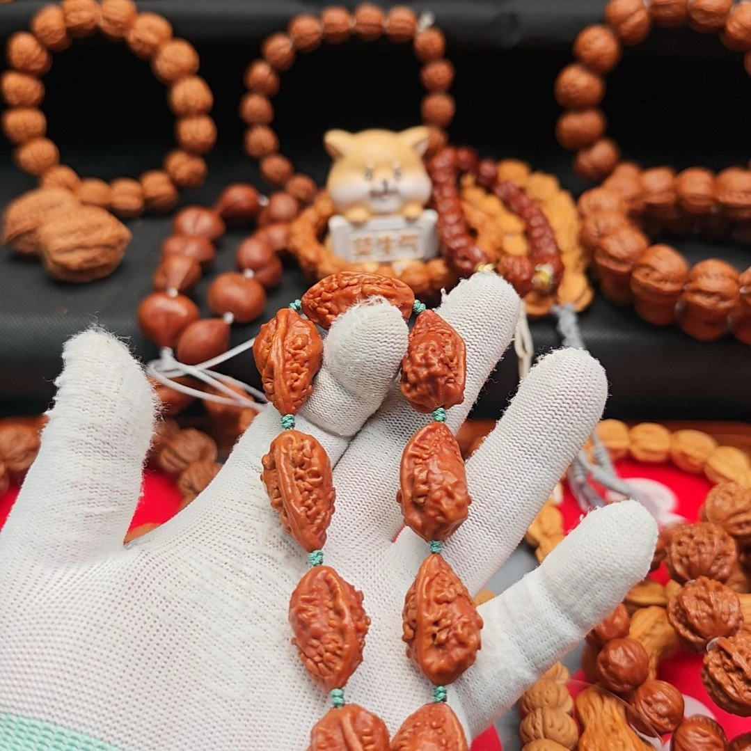 ****薇手串文玩核桃麒麟脚楸子核桃手串