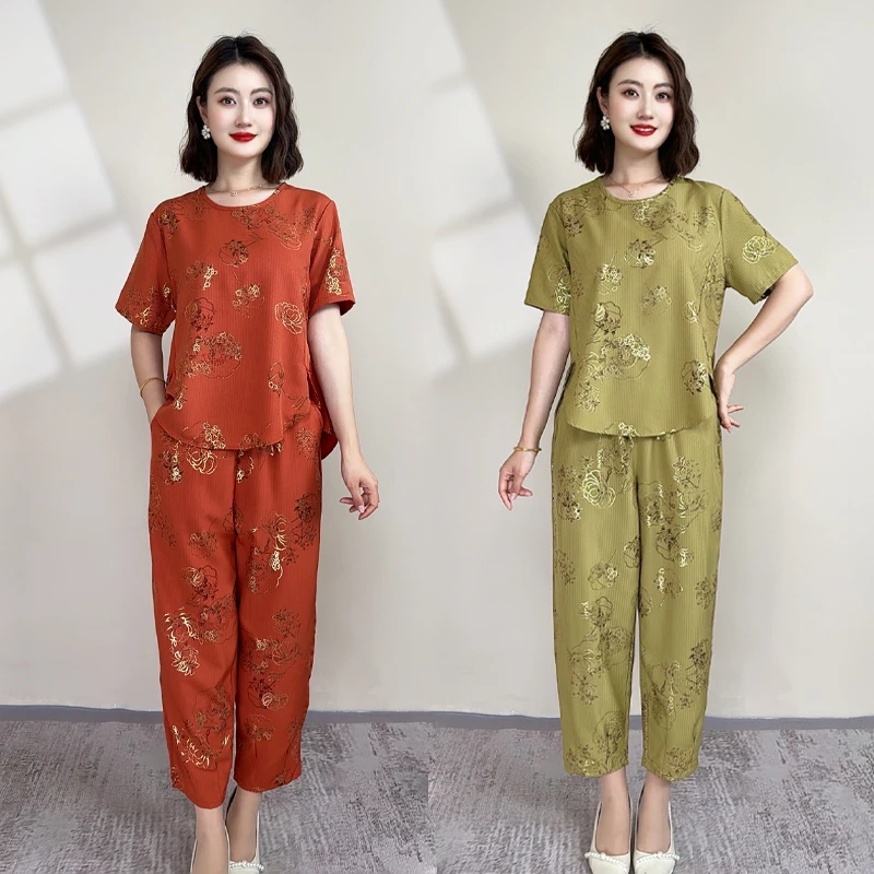 时尚口袋九分裤宽松中老年女装薄款妈妈装印花套装大码显瘦两件套