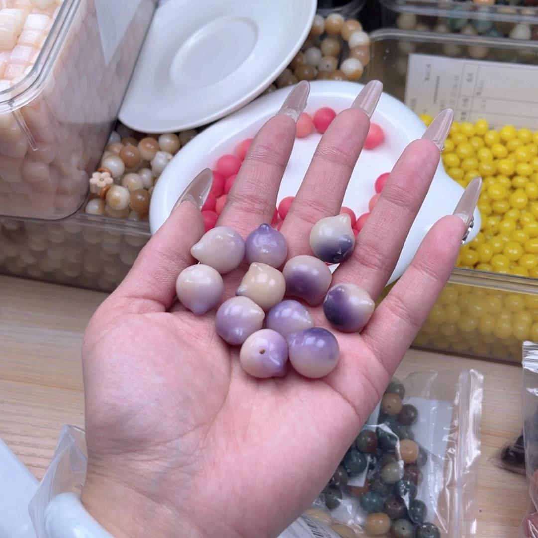 白玉菩提吊坠z15.5mm20颗 紫飘猫头 微瑕