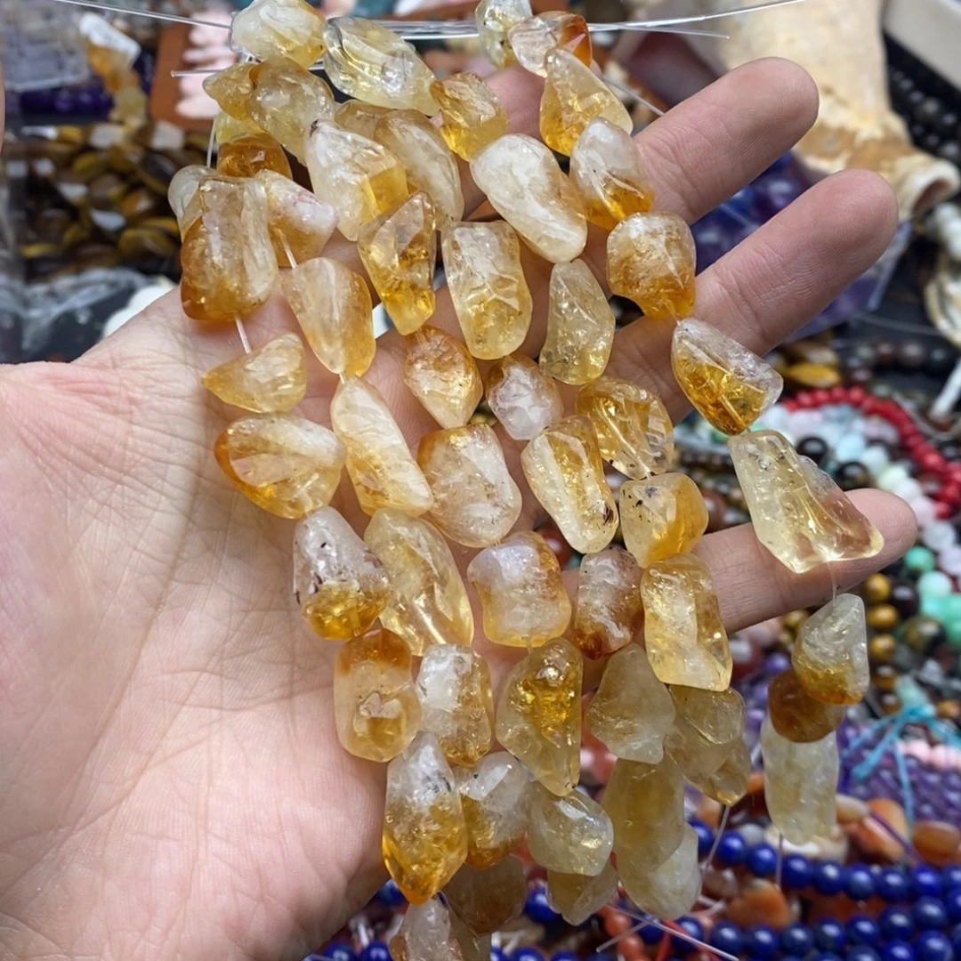 玛瑙/玉髓未镶嵌珠宝半成品一条十个天然黄塔晶通孔原石