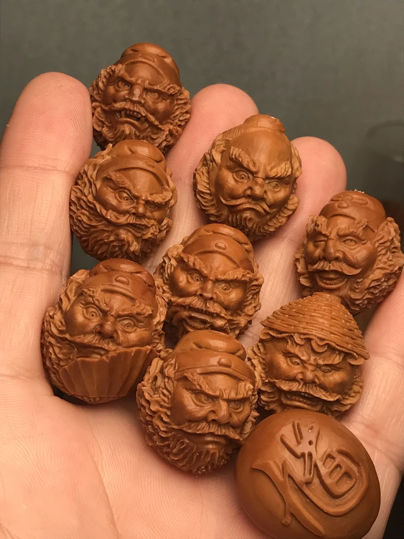 橄榄核雕刻钟馗头手串