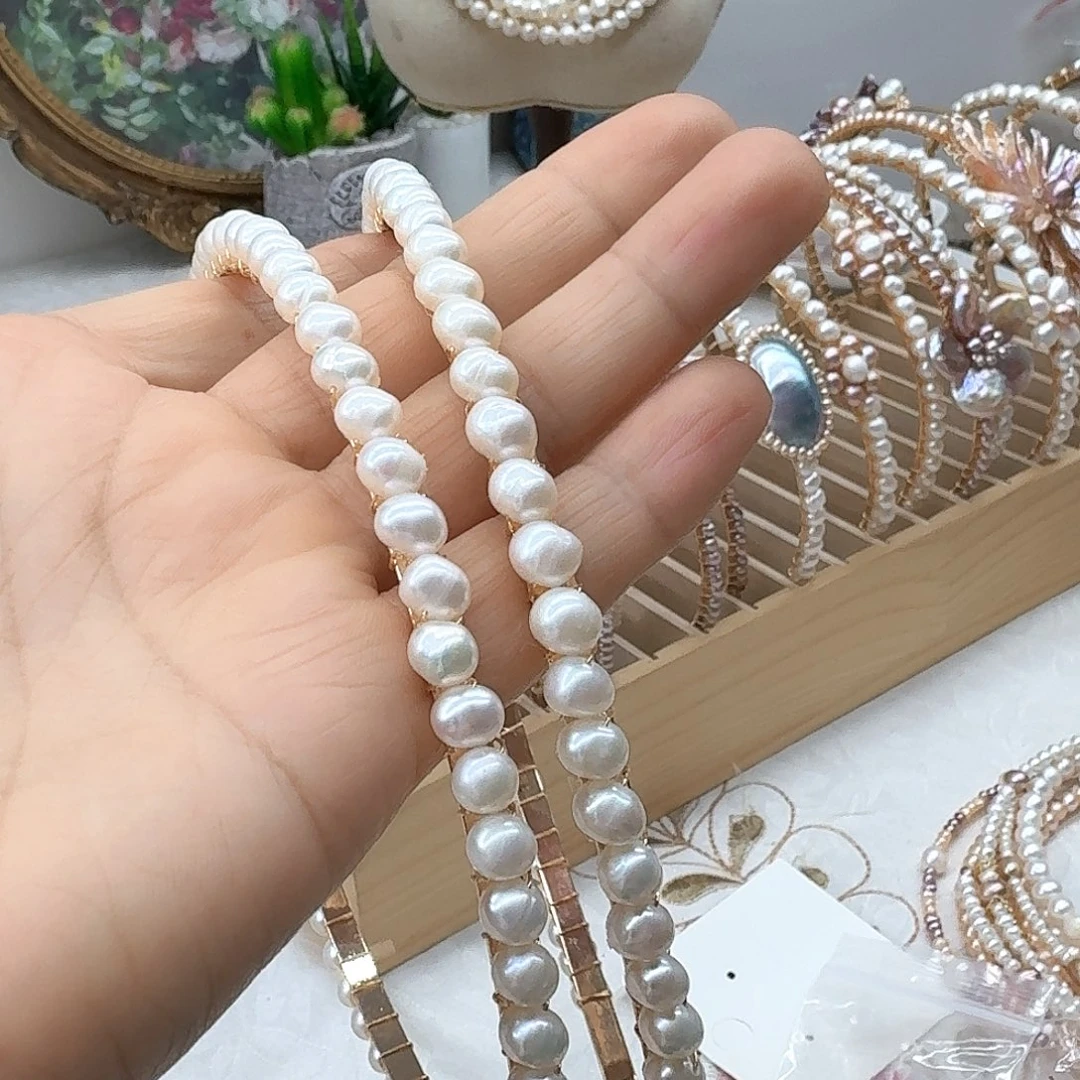 霞***霞银S925镶嵌淡水珍珠发饰