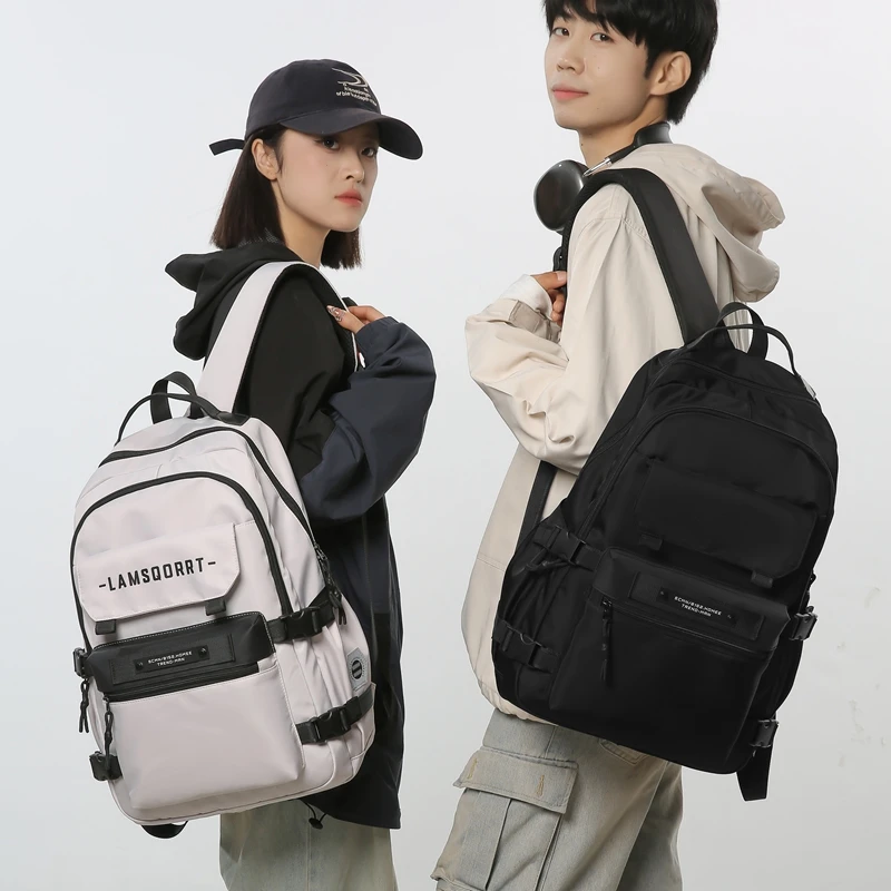 减负护脊书包男士高中生大容量旅行双肩包大学生初中女生轻便背包