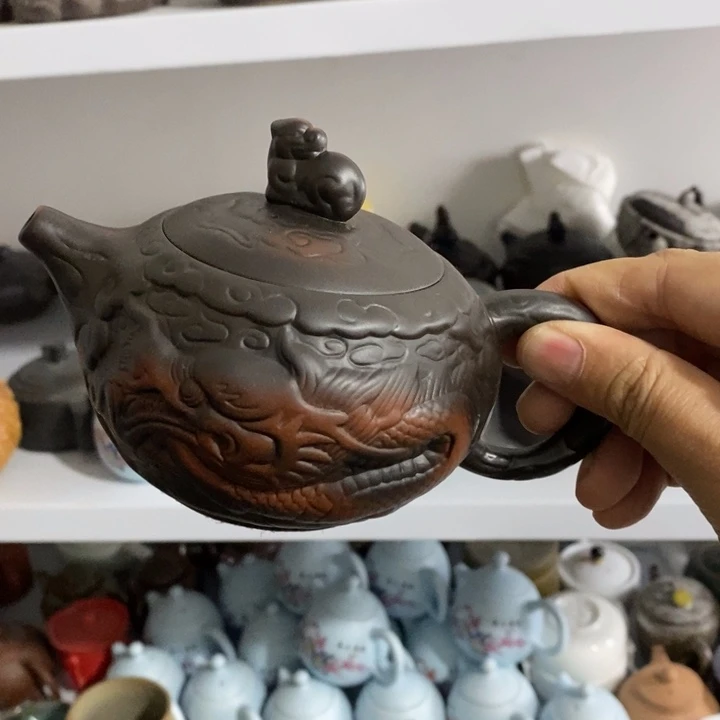 陶瓷艺术品及陶瓷壶带****人