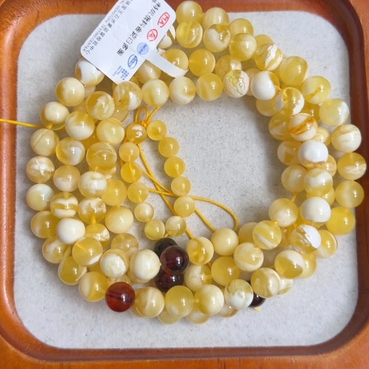 琥珀未镶嵌珠宝奇石M219号7+金瓷白妖花