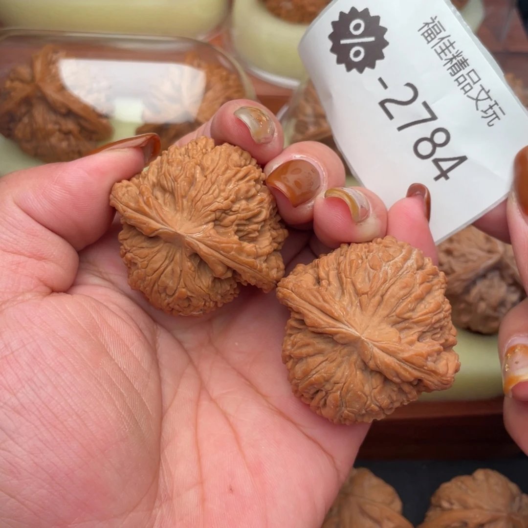 文玩核桃把件43红皮头货南疆石