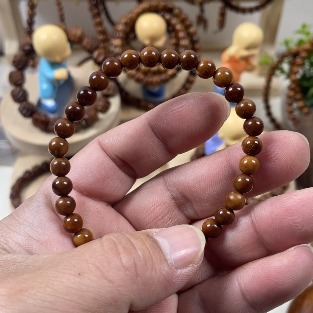 果皮卍****卍库克06单圈手串