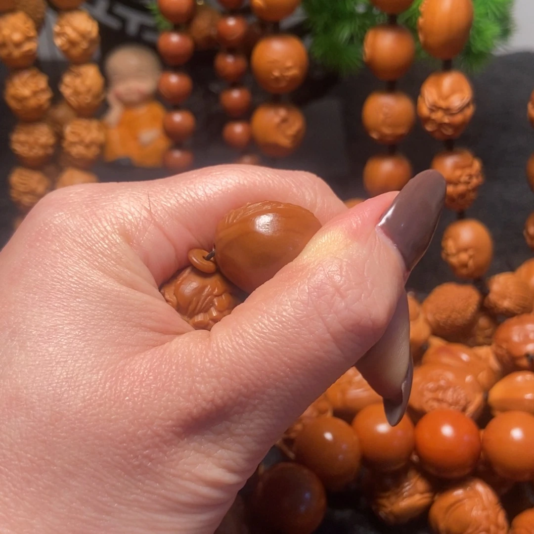 橄榄核吊坠春宫图