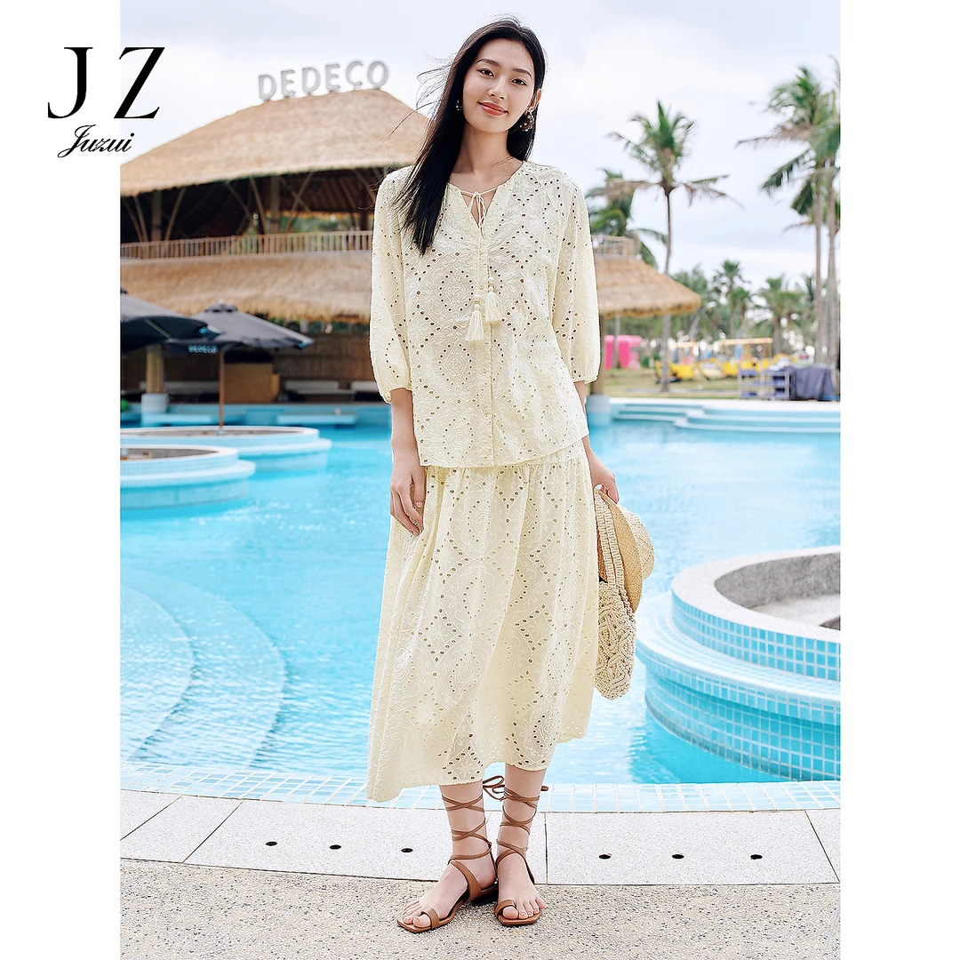 玖姿安娜蔻慵懒度假镂空绣花半身伞裙女2025夏季新款KWFX20018