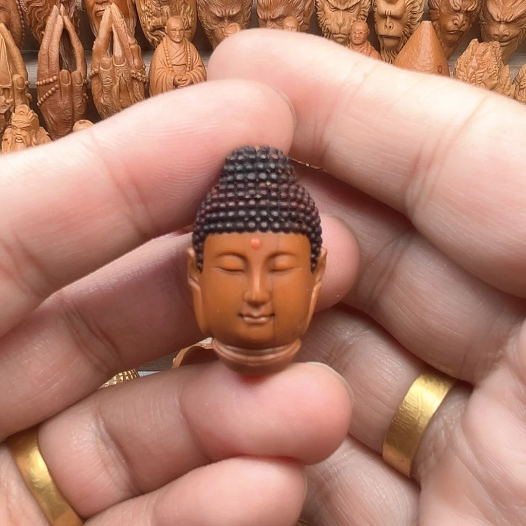 橄榄核吊坠也****720佛头福利