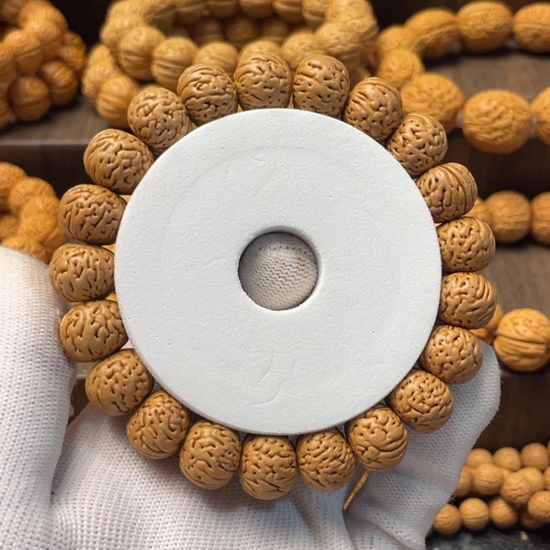 手串桃核℡****矮桩红魔