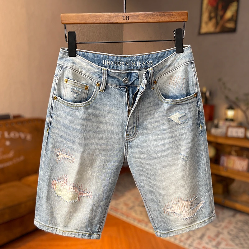 轻奢棉感牛仔五分裤男2025夏季新款浅蓝色破洞补丁修身设计感中裤
