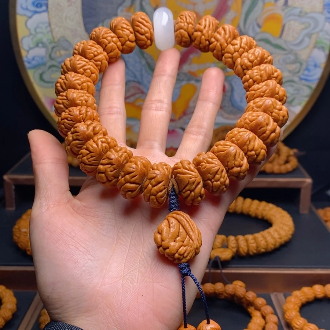 手串桃核一**缘龙纹桃核豹子头