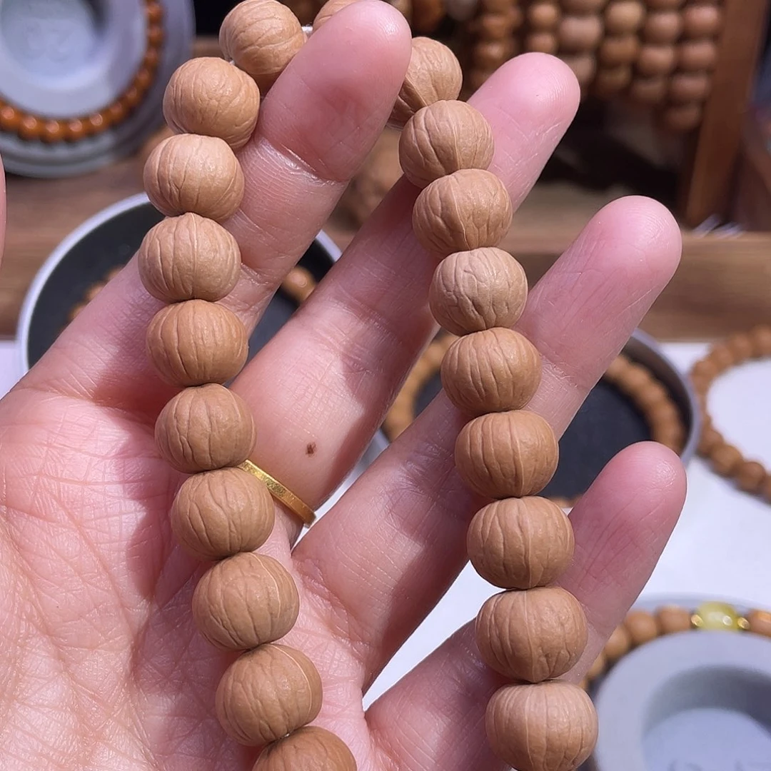 秦***.吊坠猴头核桃南瓜12mm全品