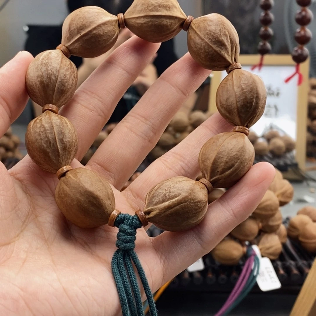 手串橄榄核温**天