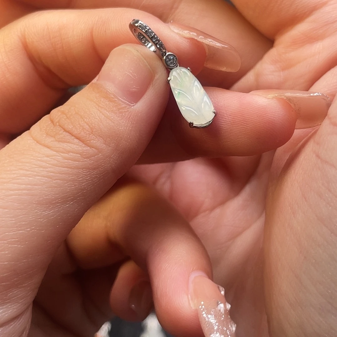 翡翠未镶嵌戒指提溜