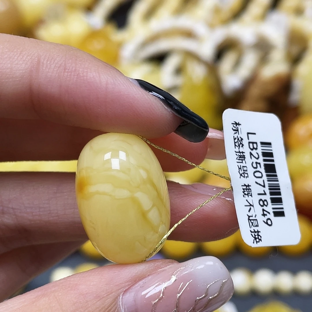 琥珀未镶嵌裸石22.2*15.3mm蜜蜡枣珠 俏色